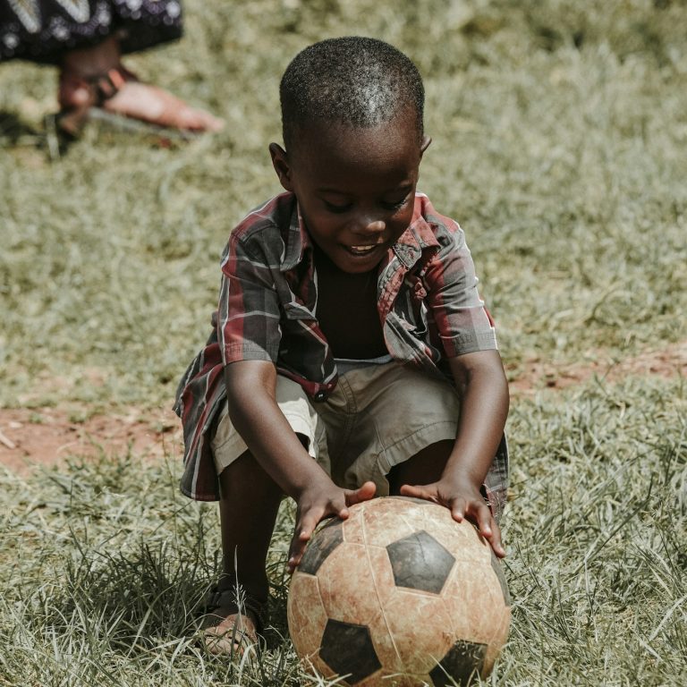 Young people playing football